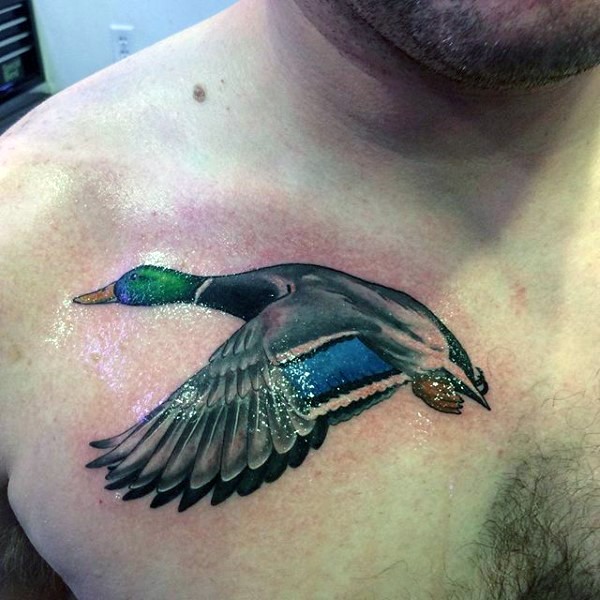 3D style marvelous colored chest tattoo of flying duck