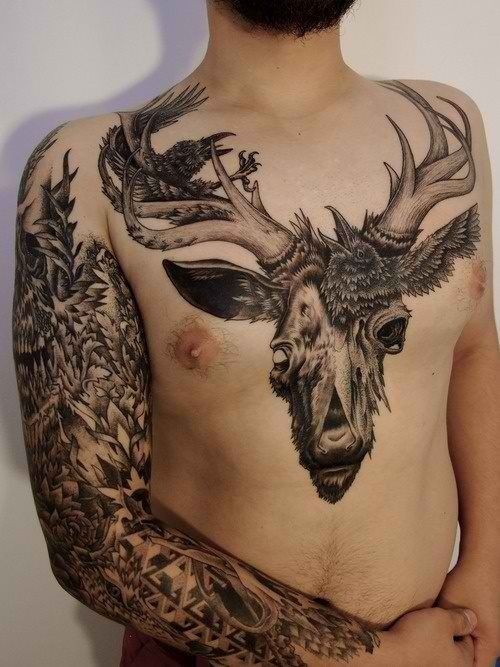 3D style original painted colored deer head tattoo on chest with animal skull