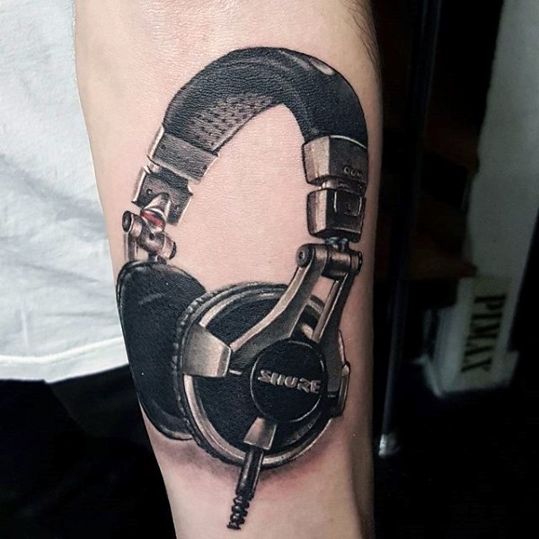 3D style painted colored very detailed headset tattoo on arm