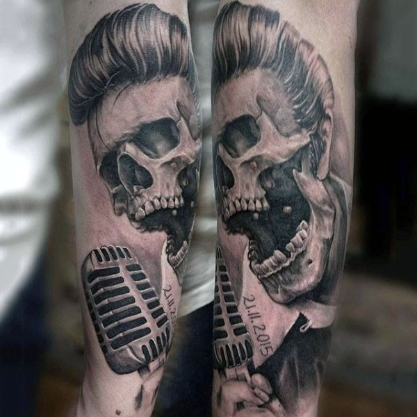 3D style painted very detailed black and white skeleton singer tattoo on arm