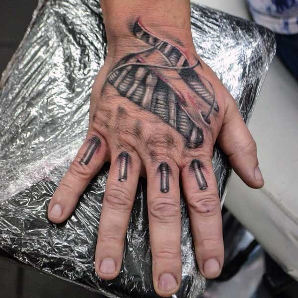3D style painted very realistic looking black and white biomechanic tattoo on hand