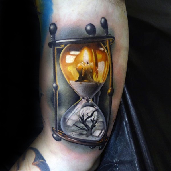 3D style realistic looking arm tattoo of old sand clock and candle