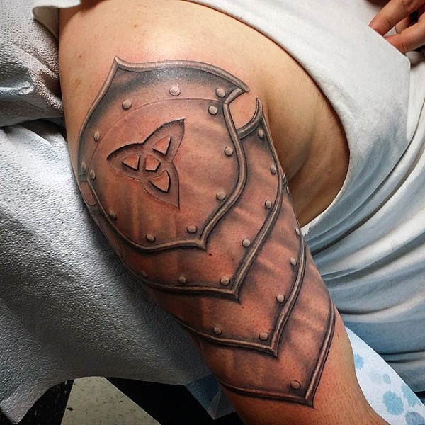3D style realistic looking shoulder tattoo of Celtic shoulder armor