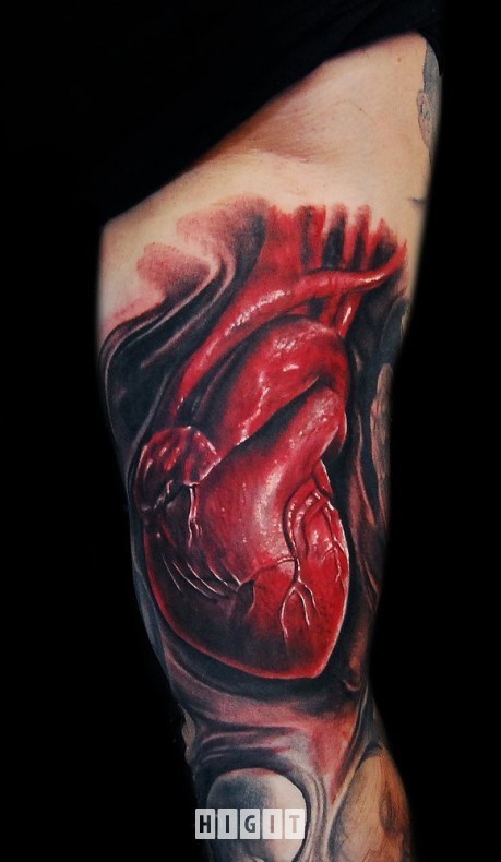 3D style very detailed arm tattoo of human heart