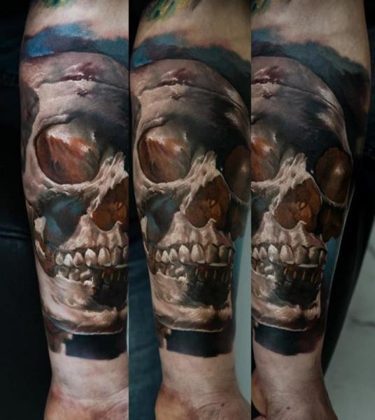 3D style very detailed forearm tattoo of human skull