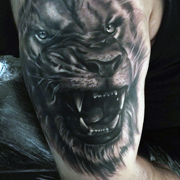 3D style very detailed roaring lion tattoo on shoulder