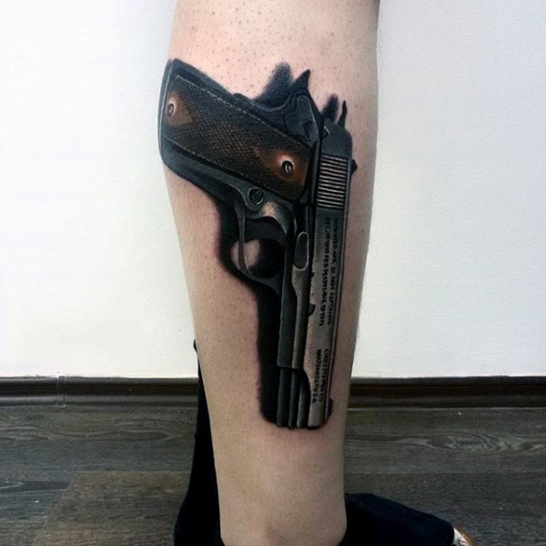 3D style very realistic looking colored leg tattoo of modern pistol