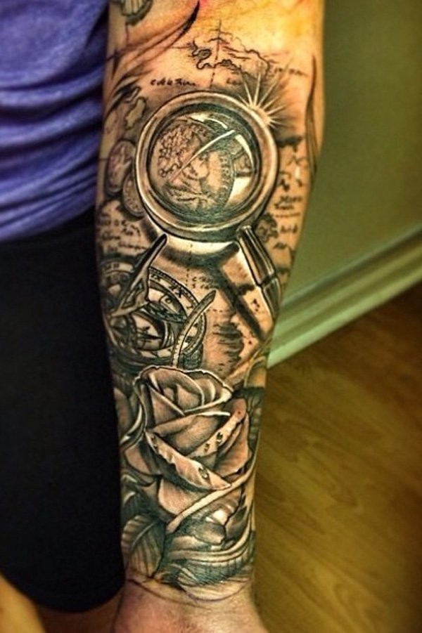 3D very detailed black and white nautical themed tattoo with compass and flowers tattoo on arm