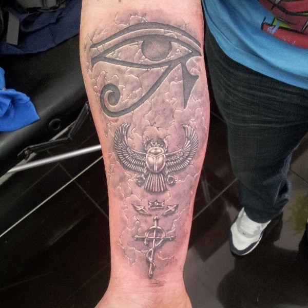 3D very detailed forearm tattoo of various Egypt themed symbols