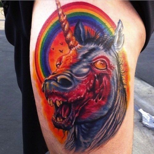 3D very detailed zombie unicorn tattoo on thigh combined with rainbow