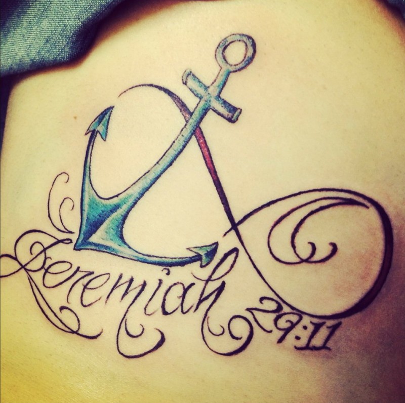 Amazing colored anchor infinity with lettering tattoo on thigh