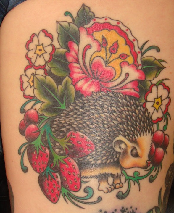 Amazing colorful hedgehog with berries and flowers tattoo