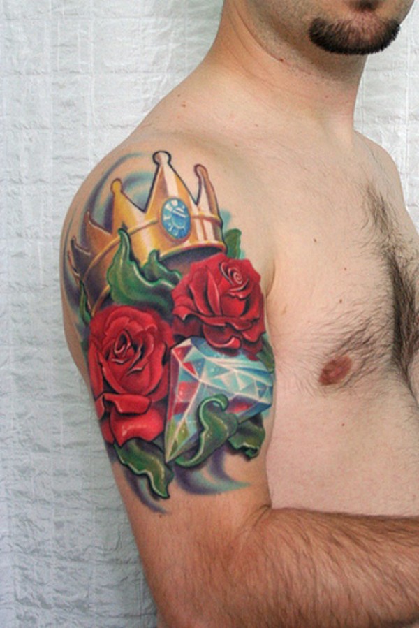 Amazing red rose flowers and crown tattoo for men on upper arm