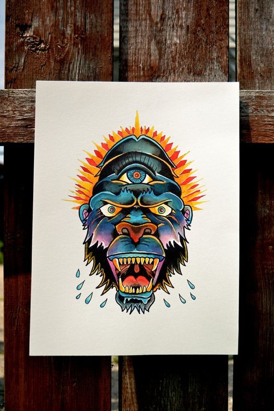 Angry colorful three-eyed gorilla tattoo design