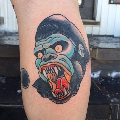 Angry old school vampire gorilla head tattoo on shin