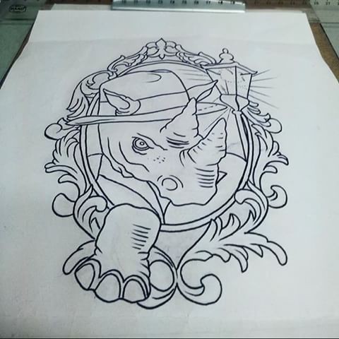 Angry outline rhino in hat with street lamp in mirror frame tattoo design