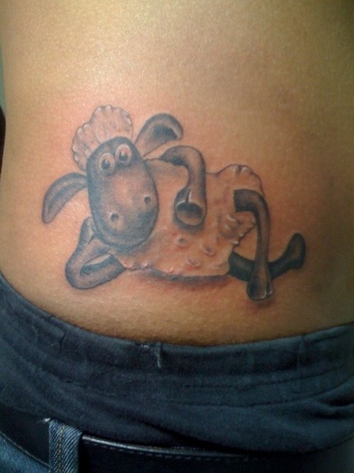 Animated black-and-white sheep tattoo on side