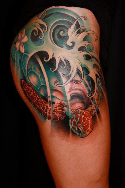 Asian style sea turtle tattoo on hip
