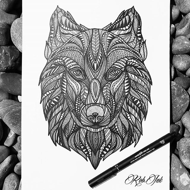 Attracative wolf head with geometric ornament tattoo design