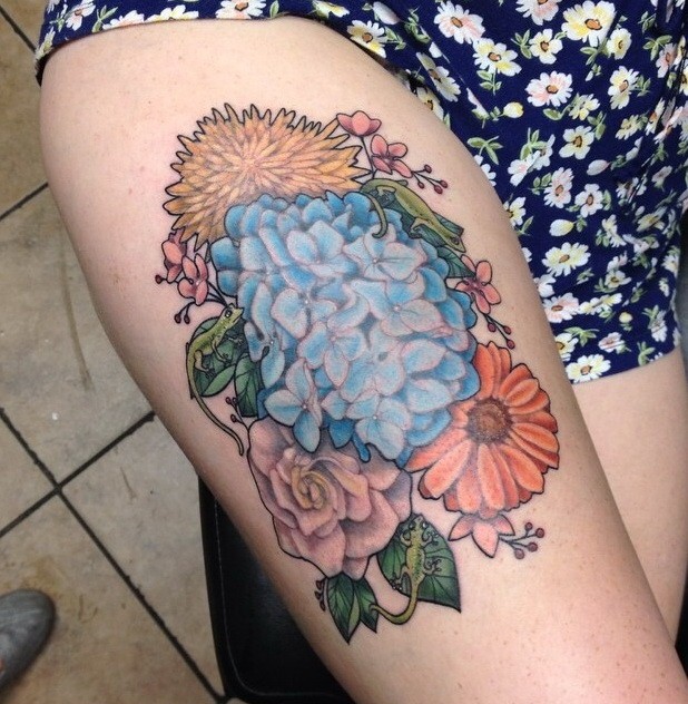 Awesome colorful flowers tattoo on thigh - Tattooimages.biz