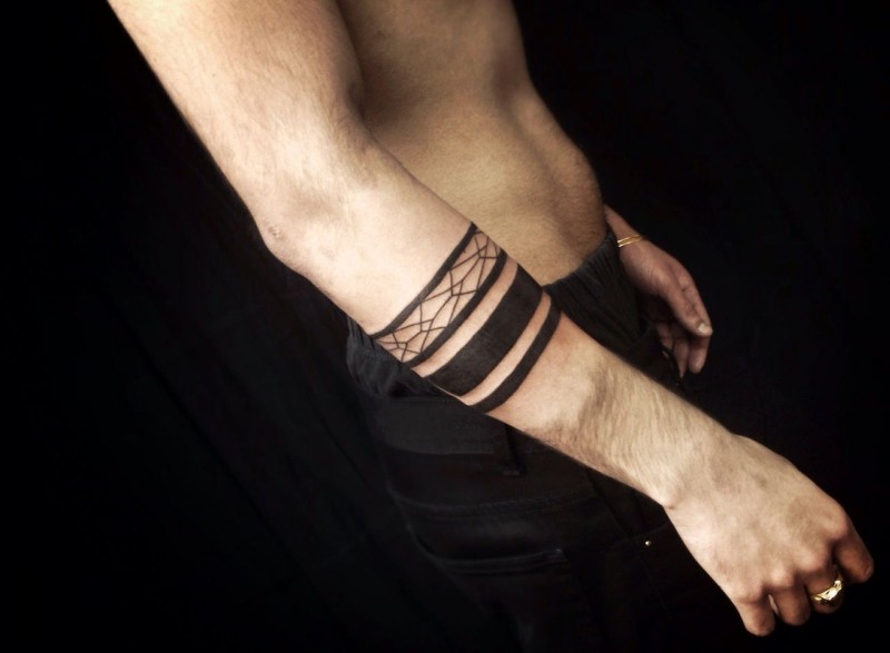 Awesome different-line band tattoo on forearm