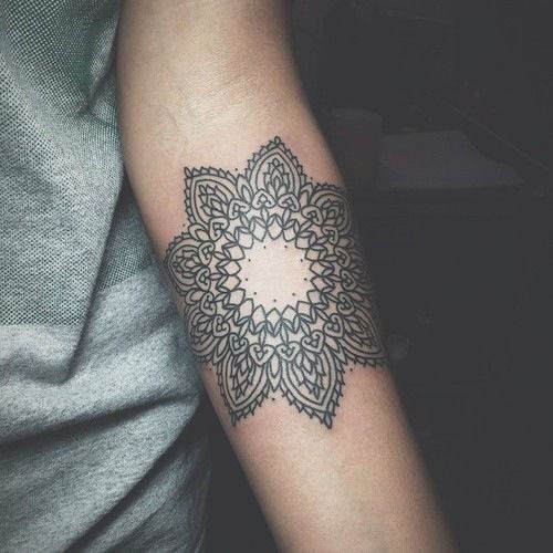 Awesome flower mandala tattoo on forearm