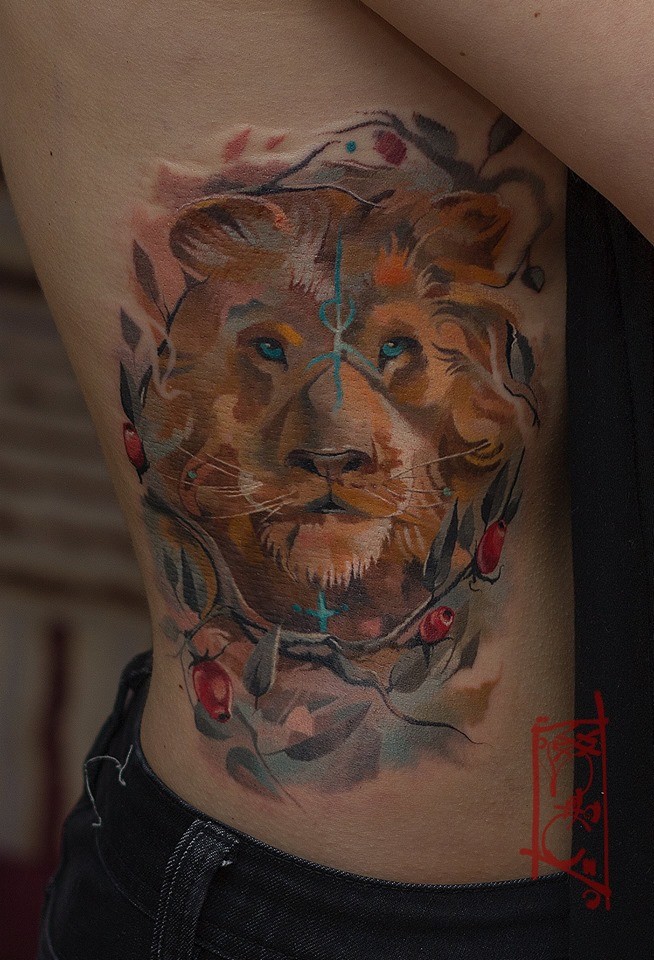 Awesome lion tattoo on side