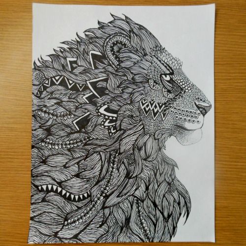 Awesome ornamented lion portrait in profile tattoo design