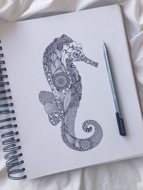 Awesome ornamented seahorse tattoo design