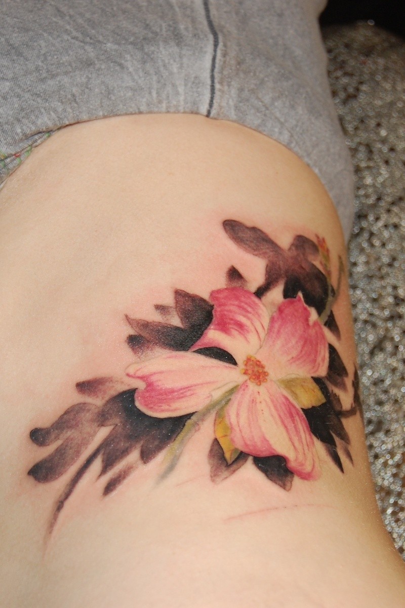 Awesome pink dogwood flower tattoo