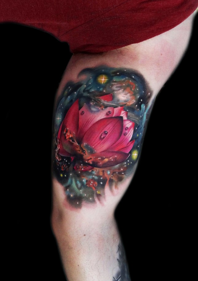 Awesome realistic flower in space tattoo on biceps