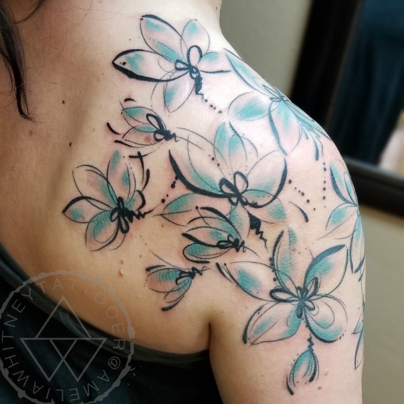Awesome watercolor flowers tattoo on shoulder