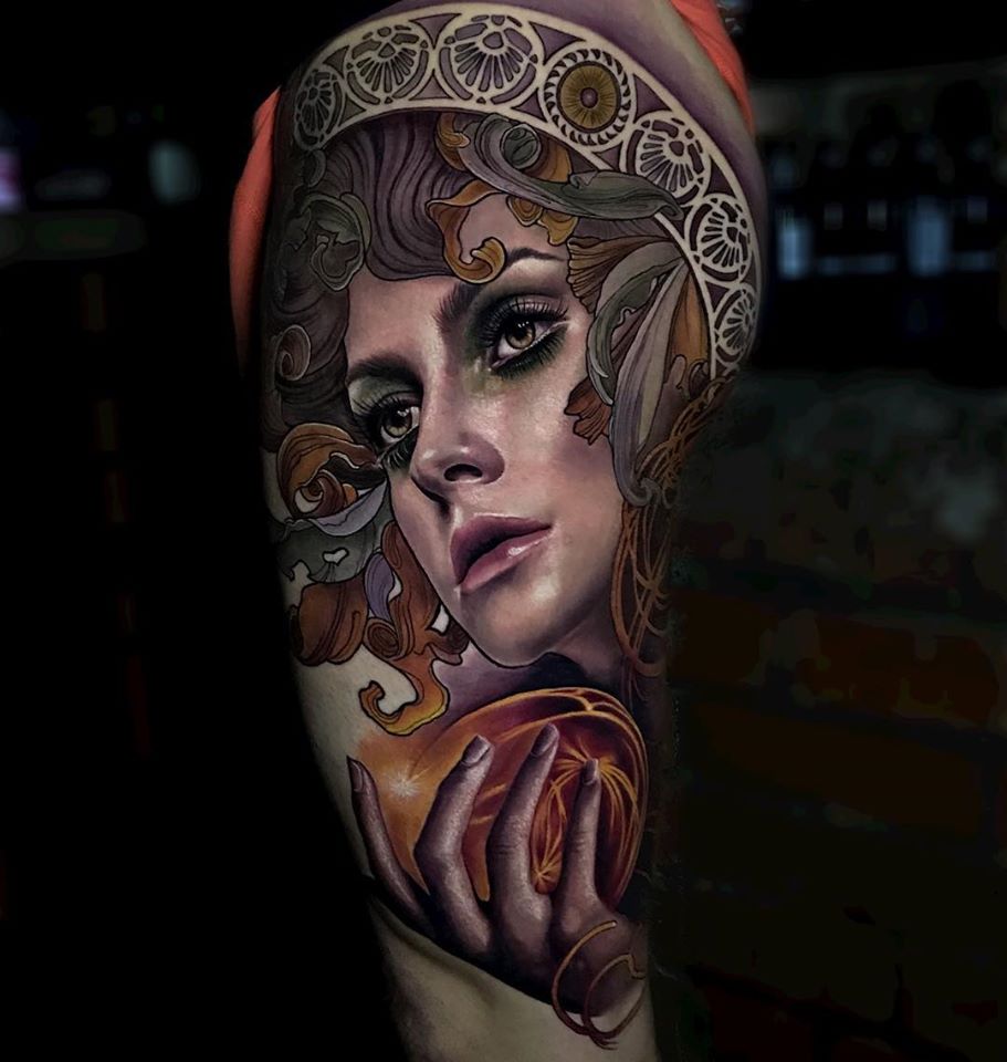 Awesome woman face tattoo on shoulder