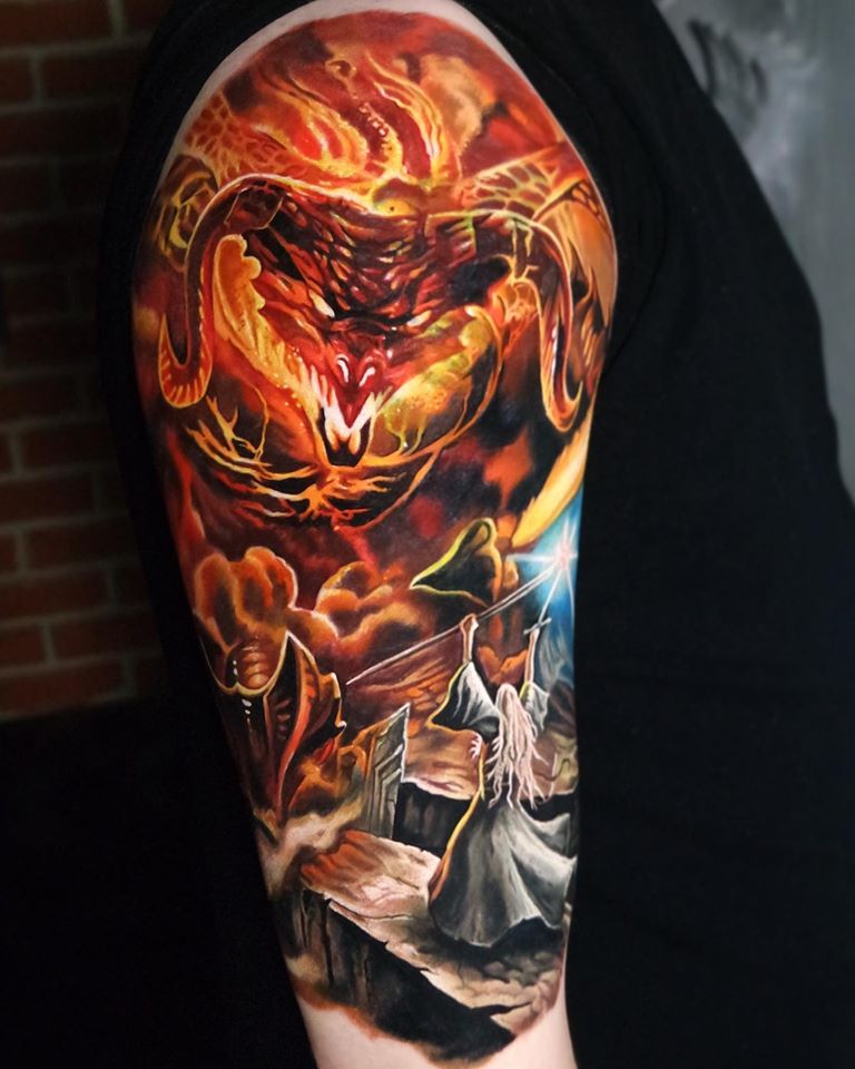 Balrog vs Gandalf fantasy tattoo on shoulder