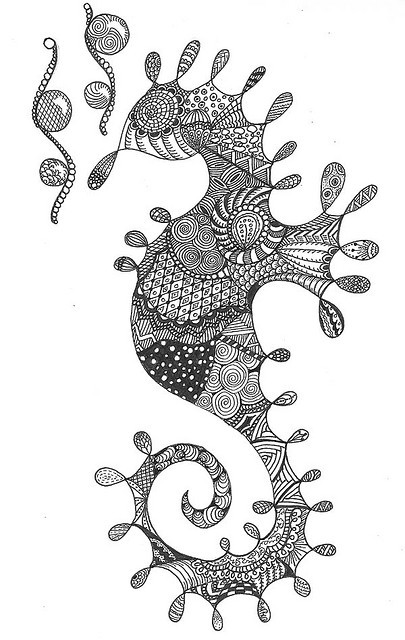 Beautiful black-ink ornamented seahorse tattoo design