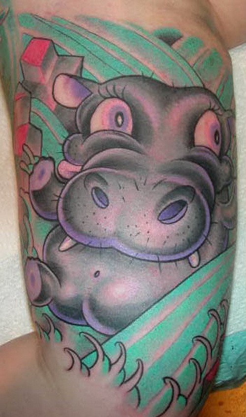 Beautiful cartoon colorful hippo on green background tattoo on arm
