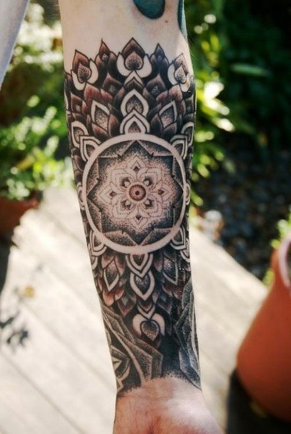 Beautiful colorful mandala tattoo sleeve on forearm