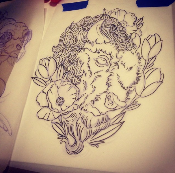 Beautiful fluffy bull surrounded with tulips tattoo design