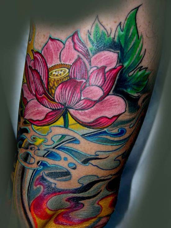 Beautiful japanese lotus flower in waves tattoo on arm