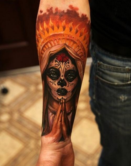 Beautiful mens colorful muerte girl tattoo on forearm