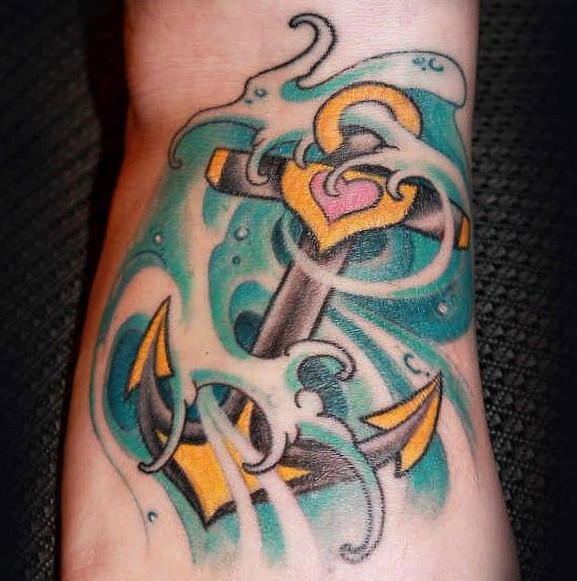 Beautiful old school anchor in waves tattoo on foot