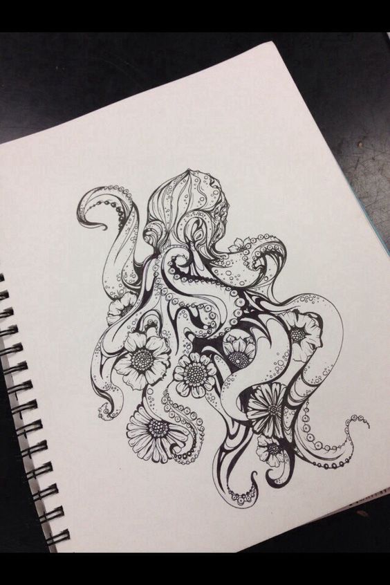 Beautiful uncolored octopus and small flowers in tentacles tattoo design