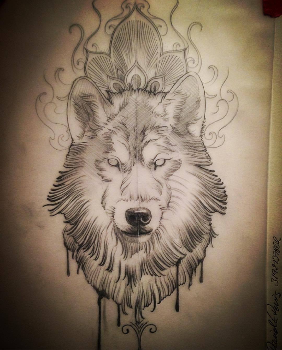 Beautiful wolf with fluffy mane and lotus ornament on top tattoo design