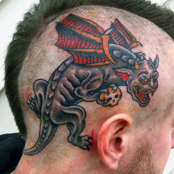 Big colored old school style gargoyle tattoo on skull