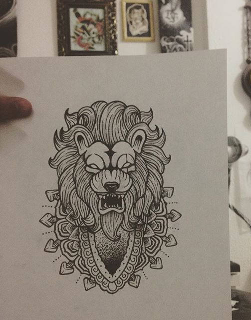 Black-and-white decorated roaring lion tattoo design
