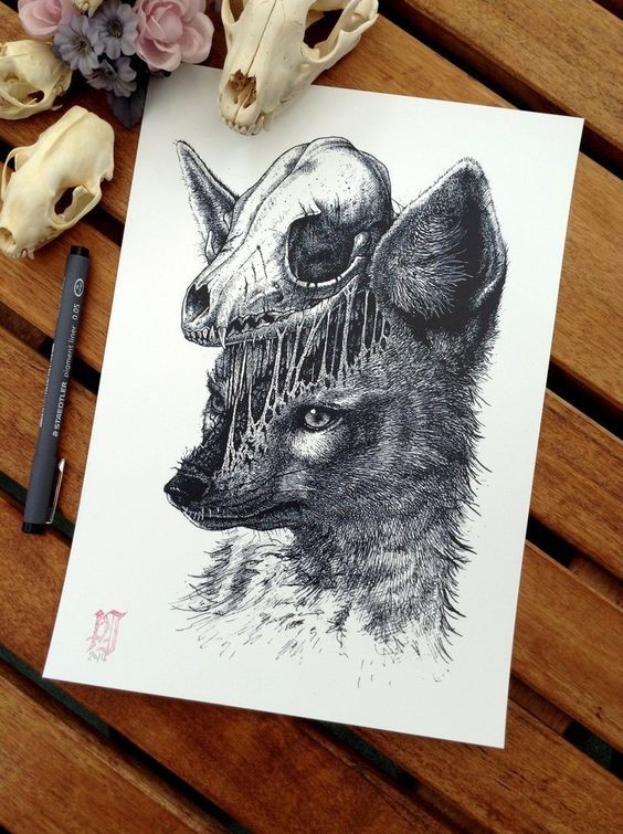 Black-and-white fox head with extempted skull tattoo design
