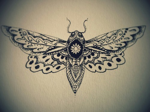 Black-and-white frilled moth tattoo design