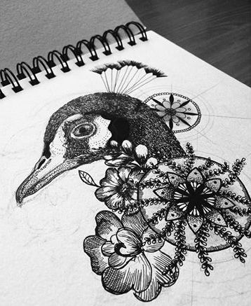 Black-and-white peacock portrait with flowers tattoo design