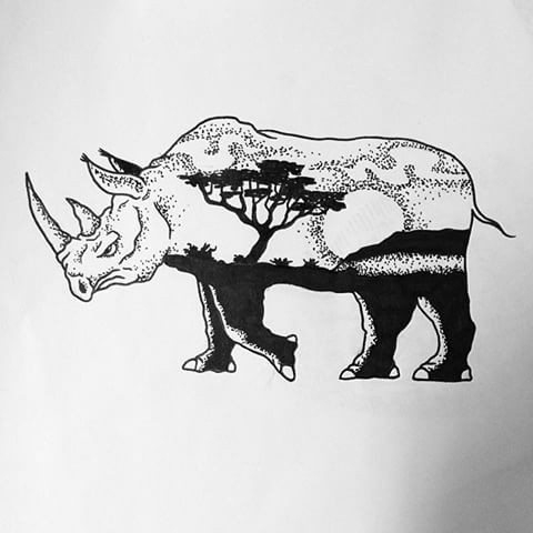 Black-and-white rhino with african nature pattern tattoo design