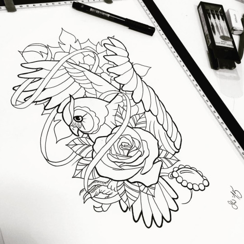 Black-contour owl and rose in curled stripe tattoo design